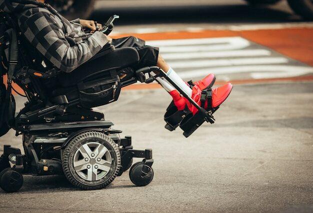 person in a mobility wheelchair