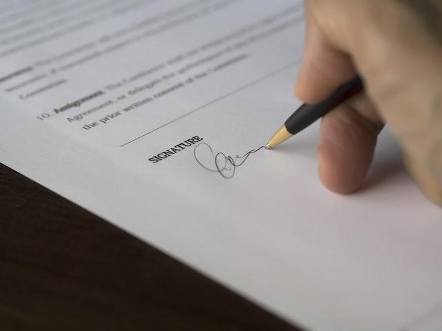 person signing contract