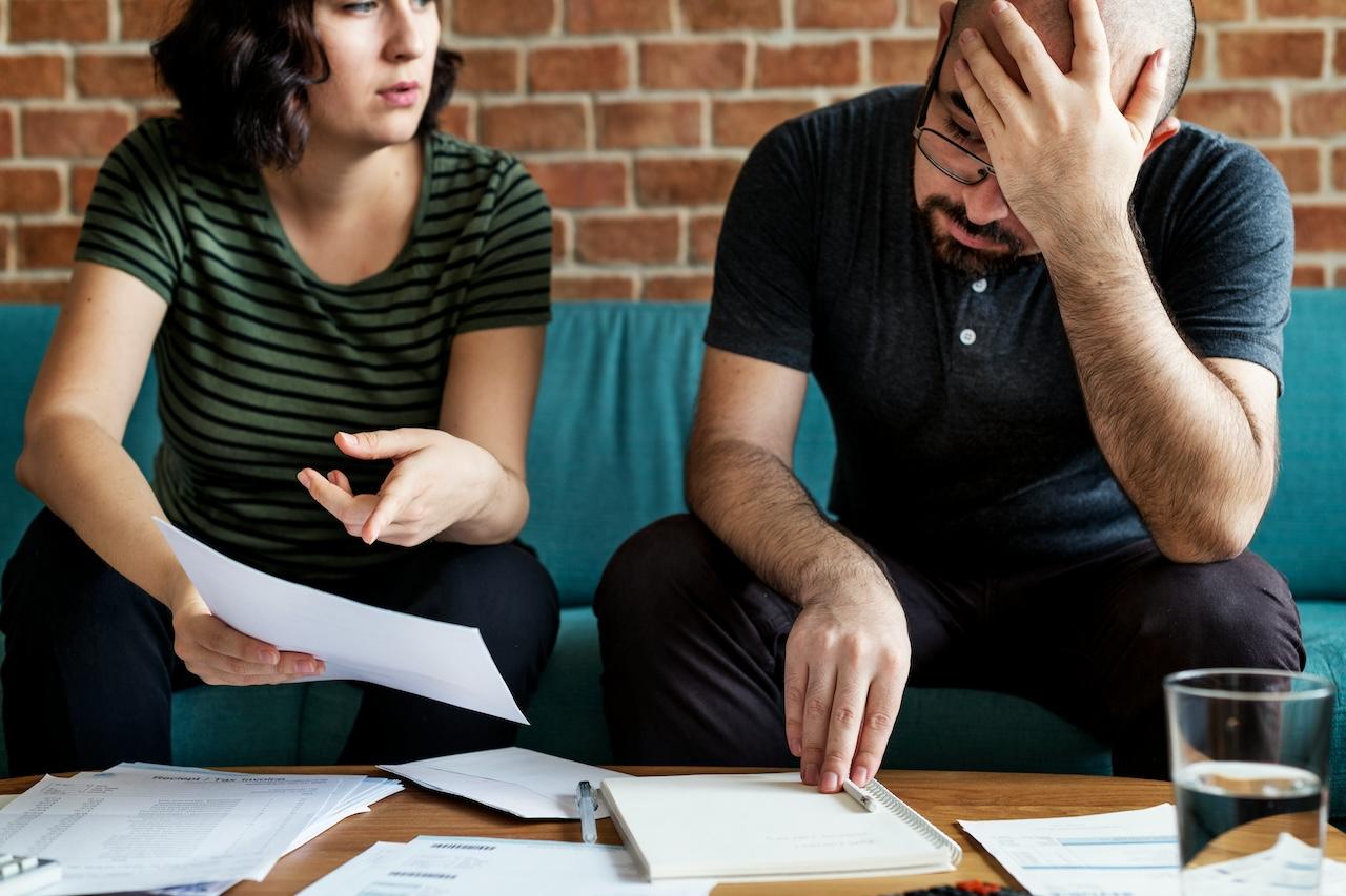 a couple reviewing documents