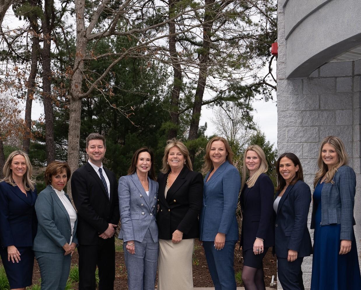 team photo of the attorneys at burner prudenti law